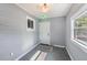 Bright sunroom with window and door access at 1841 Overbrook Ave, Clearwater, FL 33755