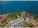 Aerial view showcasing building's location near water at 2700 Bayshore Blvd # 6308, Dunedin, FL 34698