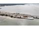 Aerial view of waterfront property with bridge and road at 2700 Bayshore Blvd # 6308, Dunedin, FL 34698