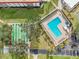 Aerial view of community pool and shuffleboard courts at 2700 Bayshore Blvd # 6308, Dunedin, FL 34698