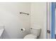Simple white toilet and shower in a small bathroom at 2700 Bayshore Blvd # 6308, Dunedin, FL 34698