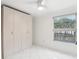 Bright bedroom with large closet and tile floor at 2700 Bayshore Blvd # 6308, Dunedin, FL 34698