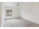Bedroom with grey carpet and lake view at 2700 Bayshore Blvd # 6308, Dunedin, FL 34698