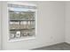 Bedroom with window view of water and trees at 2700 Bayshore Blvd # 6308, Dunedin, FL 34698