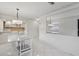 Dining area with marble table and kitchen view at 2700 Bayshore Blvd # 6308, Dunedin, FL 34698