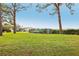 Outdoor storage for colorful kayaks near grassy area at 2700 Bayshore Blvd # 6308, Dunedin, FL 34698