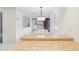 White kitchen with breakfast bar and appliances at 2700 Bayshore Blvd # 6308, Dunedin, FL 34698