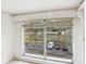 Bright living room with large windows and water view at 2700 Bayshore Blvd # 6308, Dunedin, FL 34698