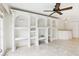 Living room with white built-in shelving at 2700 Bayshore Blvd # 6308, Dunedin, FL 34698