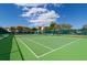 Well-maintained tennis court with green surface at 2700 Bayshore Blvd # 6308, Dunedin, FL 34698