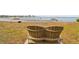 Relaxing waterfront view with a two-person chair at 2700 Bayshore Blvd # 6308, Dunedin, FL 34698
