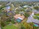 House with pool, viewed from above, surrounded by trees at 2913 Aston Ave, Plant City, FL 33566