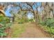 Landscaped backyard with lush greenery at 2913 Aston Ave, Plant City, FL 33566