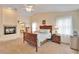 Main bedroom with fireplace and ensuite bathroom access at 2913 Aston Ave, Plant City, FL 33566