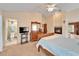 Main bedroom with ensuite bathroom and fireplace at 2913 Aston Ave, Plant City, FL 33566