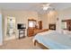 Main bedroom with ensuite bathroom and fireplace at 2913 Aston Ave, Plant City, FL 33566