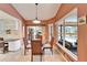 Breakfast nook with pool view and built-in workspace at 2913 Aston Ave, Plant City, FL 33566