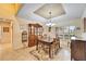 Bright dining room with a wooden table and hutch at 2913 Aston Ave, Plant City, FL 33566