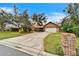 House exterior featuring a driveway and landscaping at 2913 Aston Ave, Plant City, FL 33566