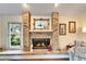 Brick fireplace with a warm and inviting ambiance at 2913 Aston Ave, Plant City, FL 33566