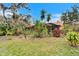 Home exterior with lush tropical plants at 2913 Aston Ave, Plant City, FL 33566