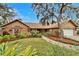 Brick house with well-manicured lawn at 2913 Aston Ave, Plant City, FL 33566