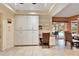 Kitchen features white cabinets and built-in desk at 2913 Aston Ave, Plant City, FL 33566