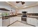 Updated kitchen with stainless steel appliances and granite countertops at 2913 Aston Ave, Plant City, FL 33566