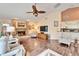 Bright living room with hardwood floors, fireplace, and open floor plan at 2913 Aston Ave, Plant City, FL 33566
