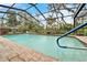 Relaxing screened pool with clear water at 2913 Aston Ave, Plant City, FL 33566