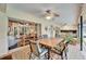 Covered patio with pool view and outdoor dining area at 2913 Aston Ave, Plant City, FL 33566