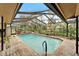 Inviting screened pool with brick pavers at 2913 Aston Ave, Plant City, FL 33566