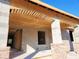 Under-construction covered porch, brick columns and wooden beams at 422 Shannon Estates Ct, Plant City, FL 33563
