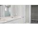 Double vanity bathroom with a large walk-in shower at 44305 Timberland Ter, Punta Gorda, FL 33982