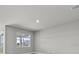 Bright living room with large window and light gray walls at 44305 Timberland Ter, Punta Gorda, FL 33982