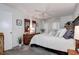 Main bedroom with updated furnishings and plenty of natural light at 4575 Cove Cir # 304, St Petersburg, FL 33708