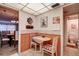 Small breakfast nook with wood-paneled walls at 4575 Cove Cir # 304, St Petersburg, FL 33708