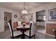 Bright dining area with kitchen access at 4575 Cove Cir # 304, St Petersburg, FL 33708