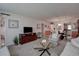 Open living room with views to dining area at 4575 Cove Cir # 304, St Petersburg, FL 33708