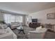 Relaxing living room with comfortable seating and TV at 4575 Cove Cir # 304, St Petersburg, FL 33708
