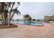 Community swimming pool with ample deck space at 4575 Cove Cir # 304, St Petersburg, FL 33708