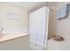 Clean bathroom with shower/tub combo, vanity, and decorative accents at 5633 Puerta Del Sol S Blvd # 203, St Petersburg, FL 33715