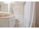 Bathroom boasts a vanity, toilet, and shower/tub combo at 5633 Puerta Del Sol S Blvd # 203, St Petersburg, FL 33715