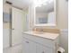 Bathroom features a vanity, toilet and access to another room at 5633 Puerta Del Sol S Blvd # 203, St Petersburg, FL 33715
