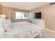 Bright bedroom with water views and white dresser at 5633 Puerta Del Sol S Blvd # 203, St Petersburg, FL 33715