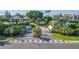 Aerial view of community entrance and landscaping at 5633 Puerta Del Sol S Blvd # 203, St Petersburg, FL 33715