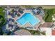 Aerial view of a refreshing pool with plenty of lounge chairs at 5633 Puerta Del Sol S Blvd # 203, St Petersburg, FL 33715
