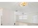 Living room with tile floors and window at 5940 30Th S Ave # 209, Gulfport, FL 33707
