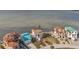 Aerial view of waterfront homes with private docks and boat parking at 6423 Driftwood Dr, Hudson, FL 34667