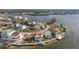 Waterfront community with a variety of homes and lush landscaping at 6423 Driftwood Dr, Hudson, FL 34667